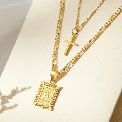 Set de Collar con Inicial en Cruz | Oro