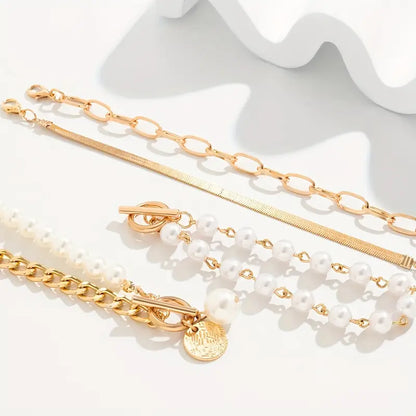 Set de Pulseras Chic de Oro de 4 Piezas - Serpiente, Perlas y Eslabones | Oro