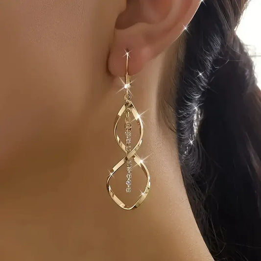 Aretes Espiral Rayo de Sol | Oro